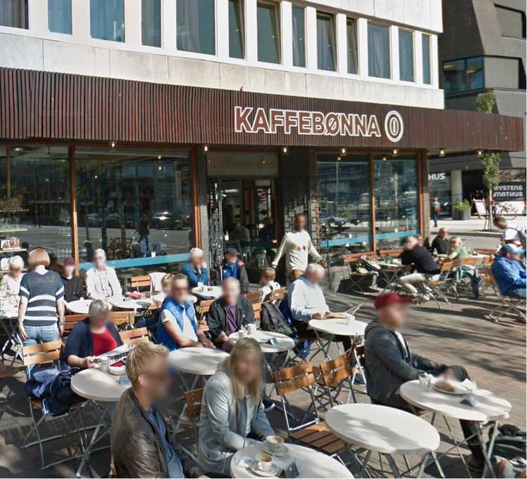 People sitting outside a Kaffebønna cafe with the store's name displayed.